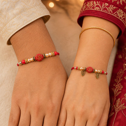Couple Om Rakhi Set with Red Beads, Golden Leaf Charms and Festive Lumba Pair Design