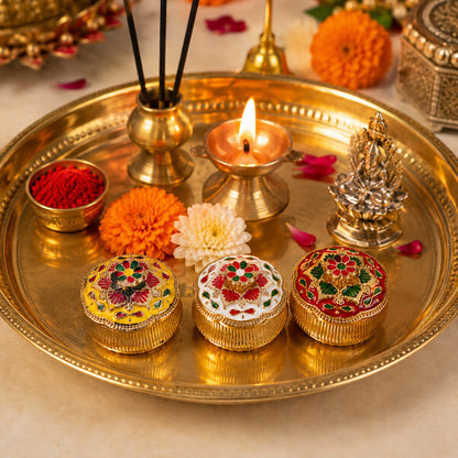 Decorative kumkum container in pooja setup