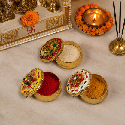 Kankavati containers with pooja essentials