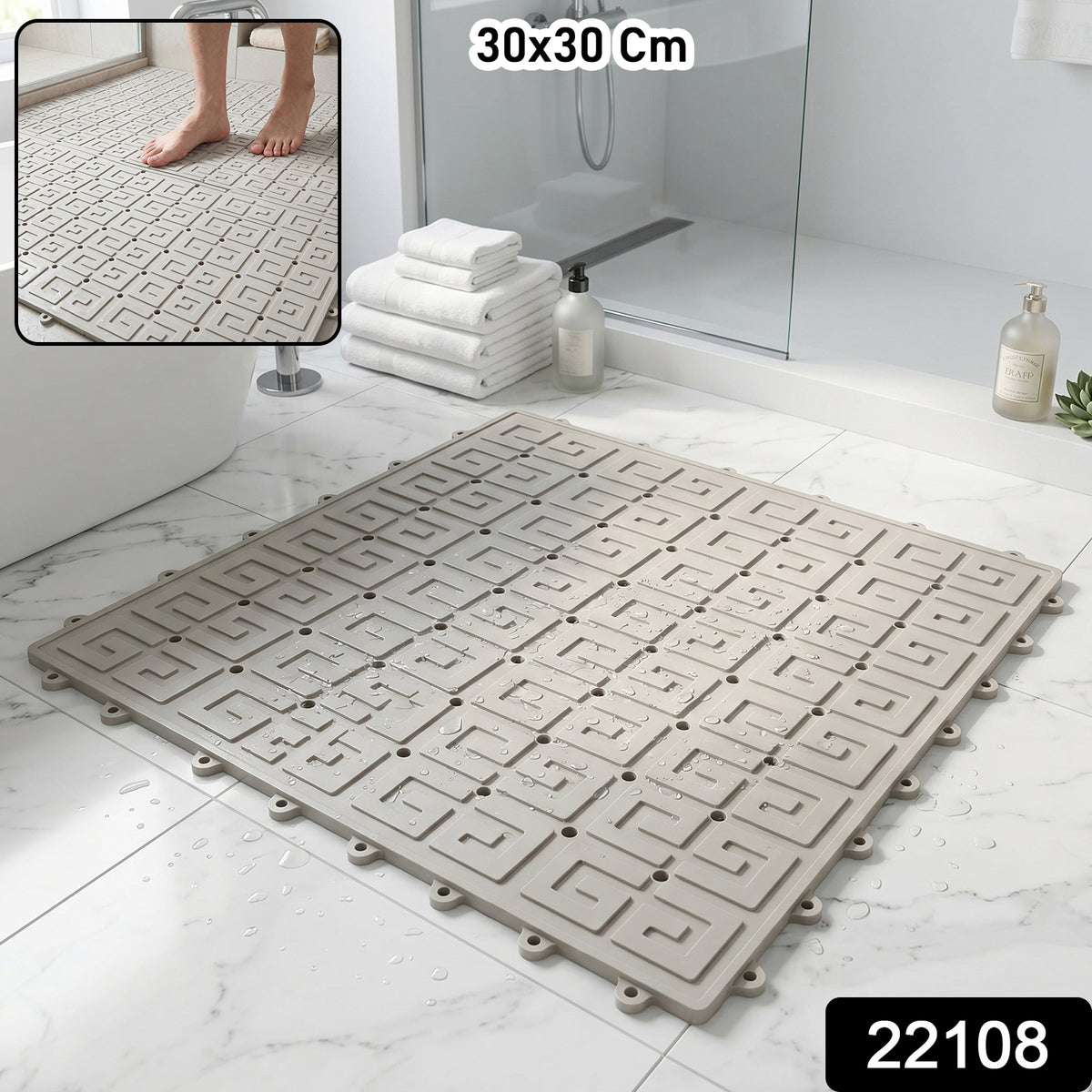 Close-up of textured non-slip shower floor mat with drainage holes