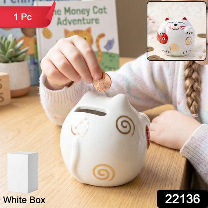 Side view of adorable ceramic cat piggy bank, ideal for home decor and gift.