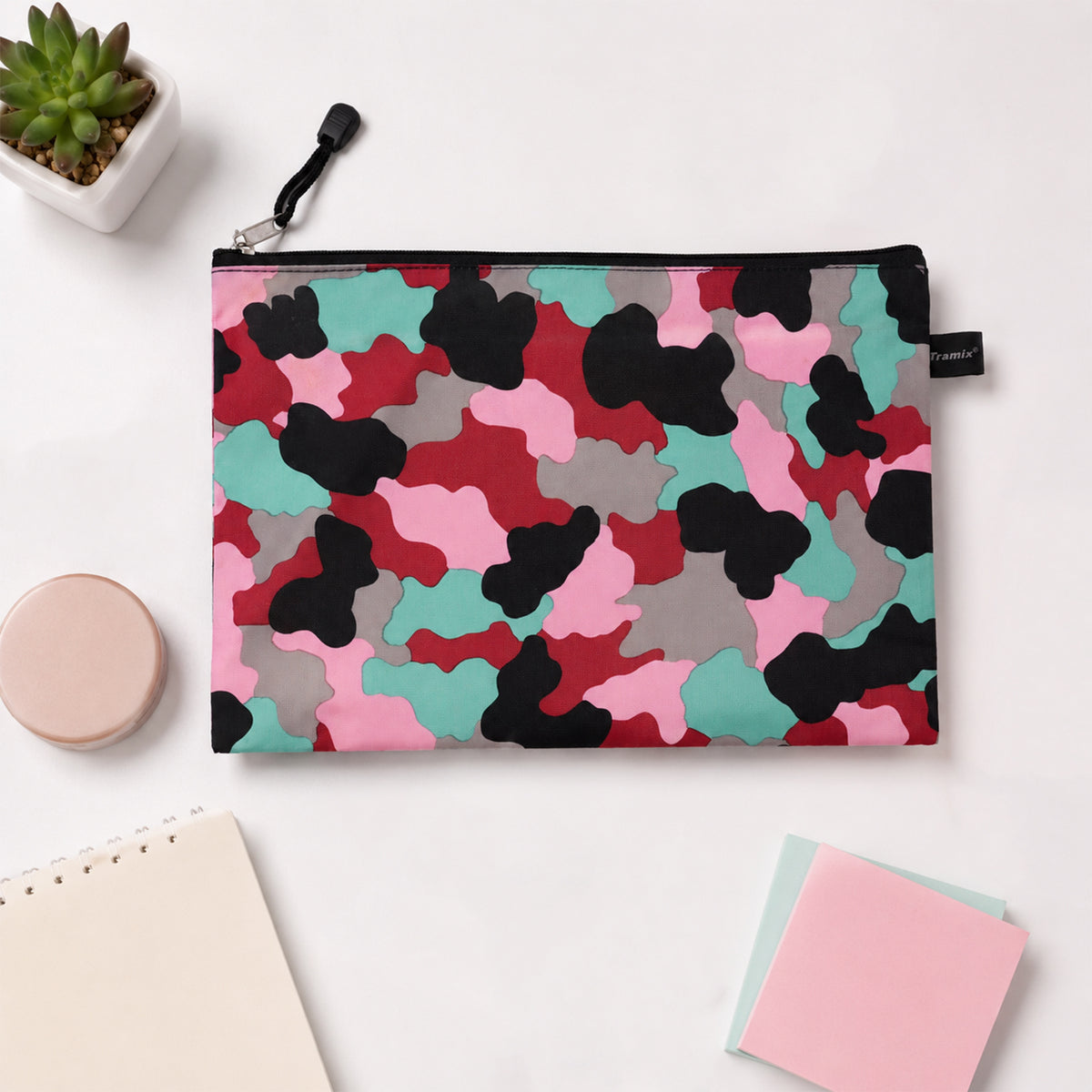 Printed multipurpose zipper pouch on clean desk setting