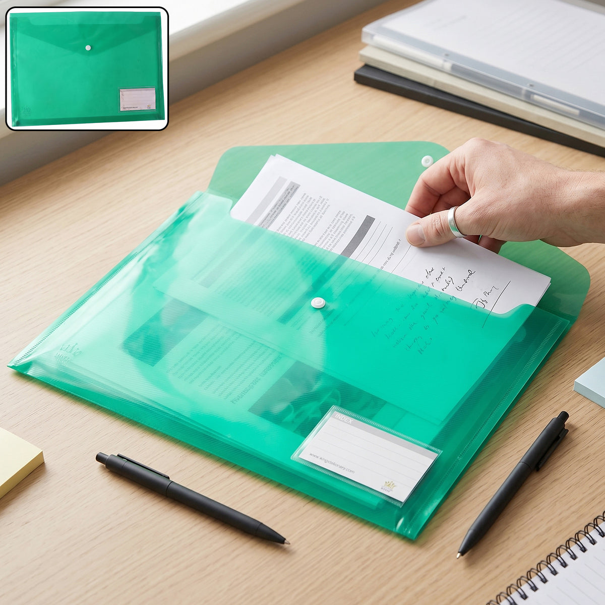 Plastic document file folder open with papers and button closure