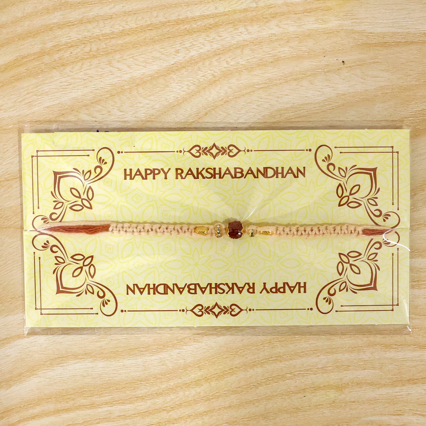 Beautiful Silver Style Rakhi with Soft Beads, Stone Detail and Premium Festive Look