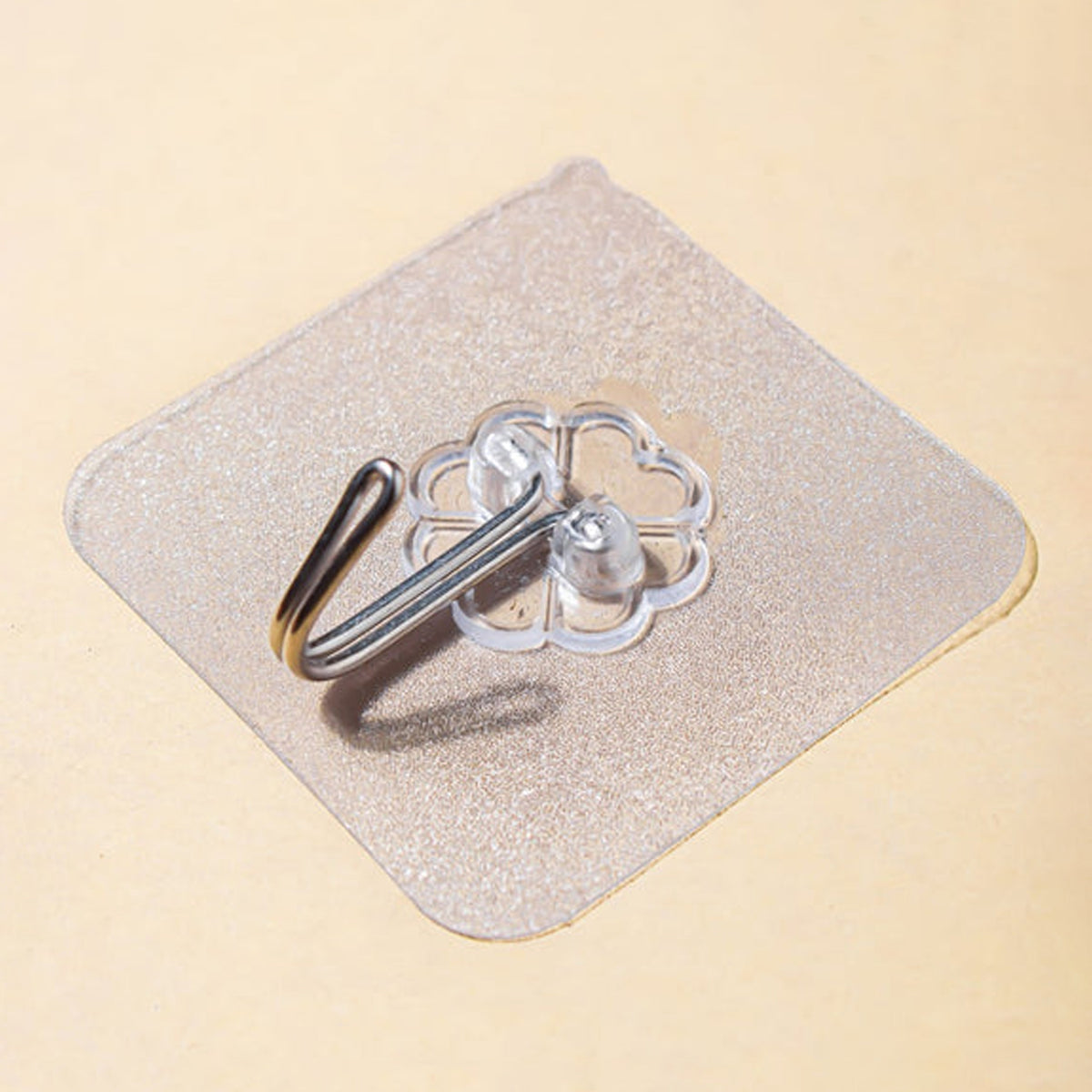Self adhesive transparent wall hook