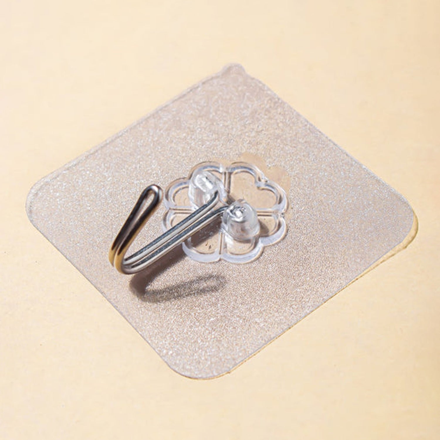 Self adhesive transparent wall hook