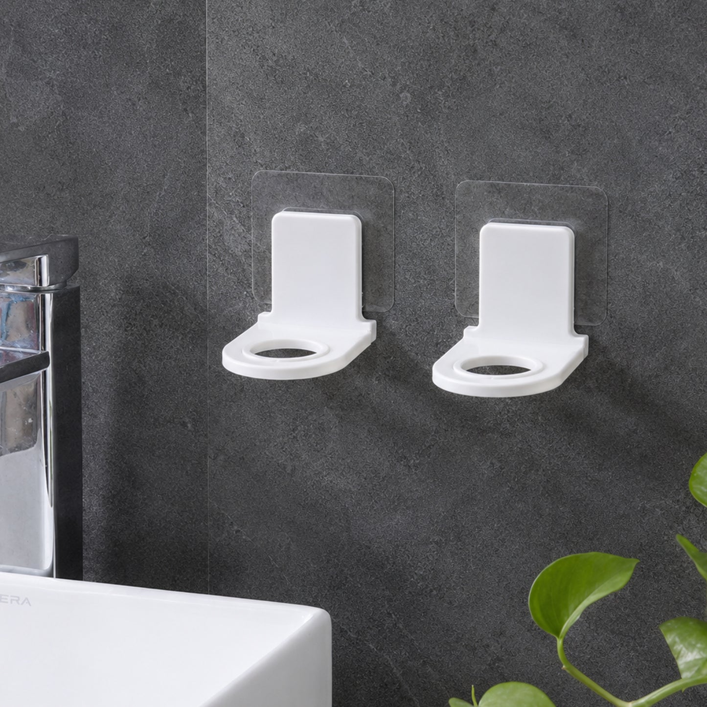 Self adhesive bottle holders mounted near sink