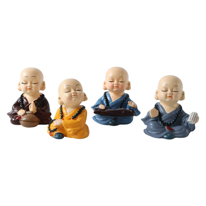baby monk Buddha figurine set white background