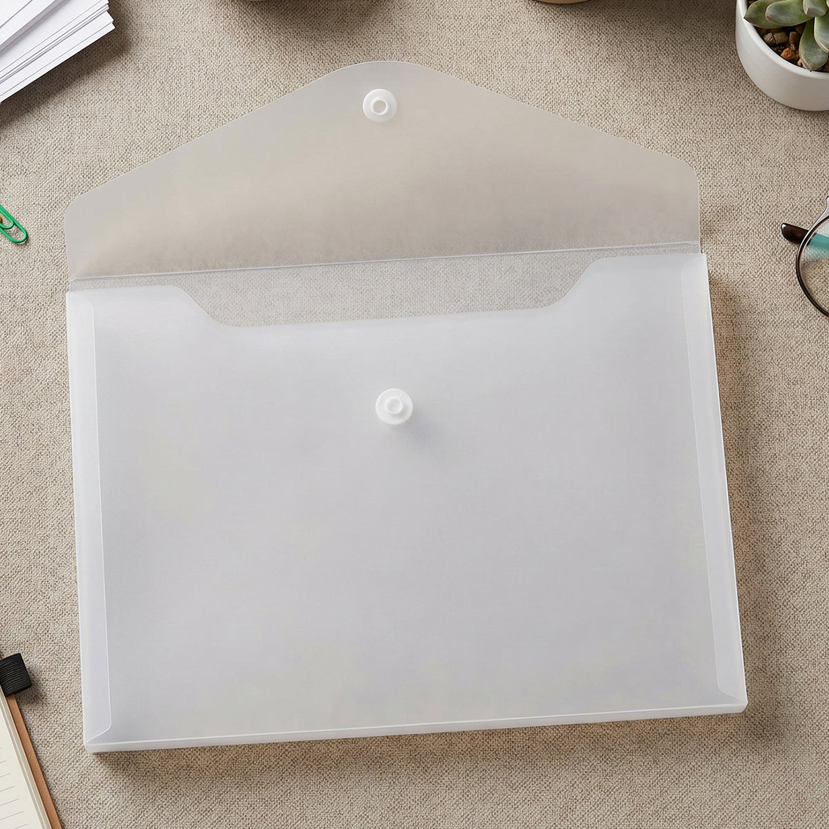 Transparent file folder open showing spacious document pocket