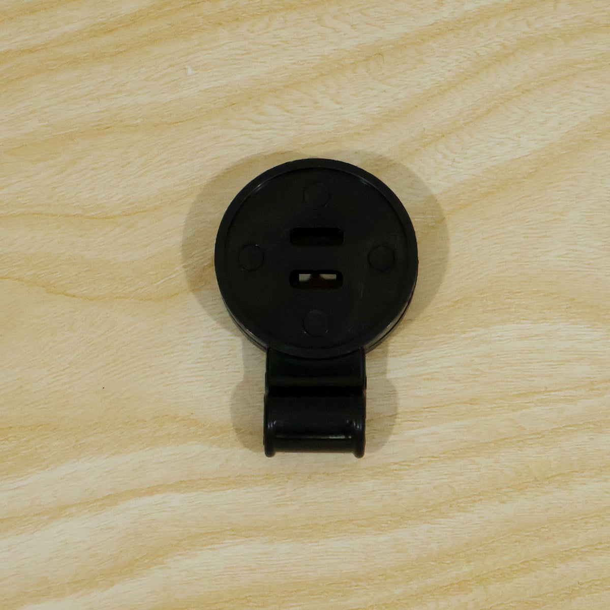 Live photo of black plastic shade cloth clip