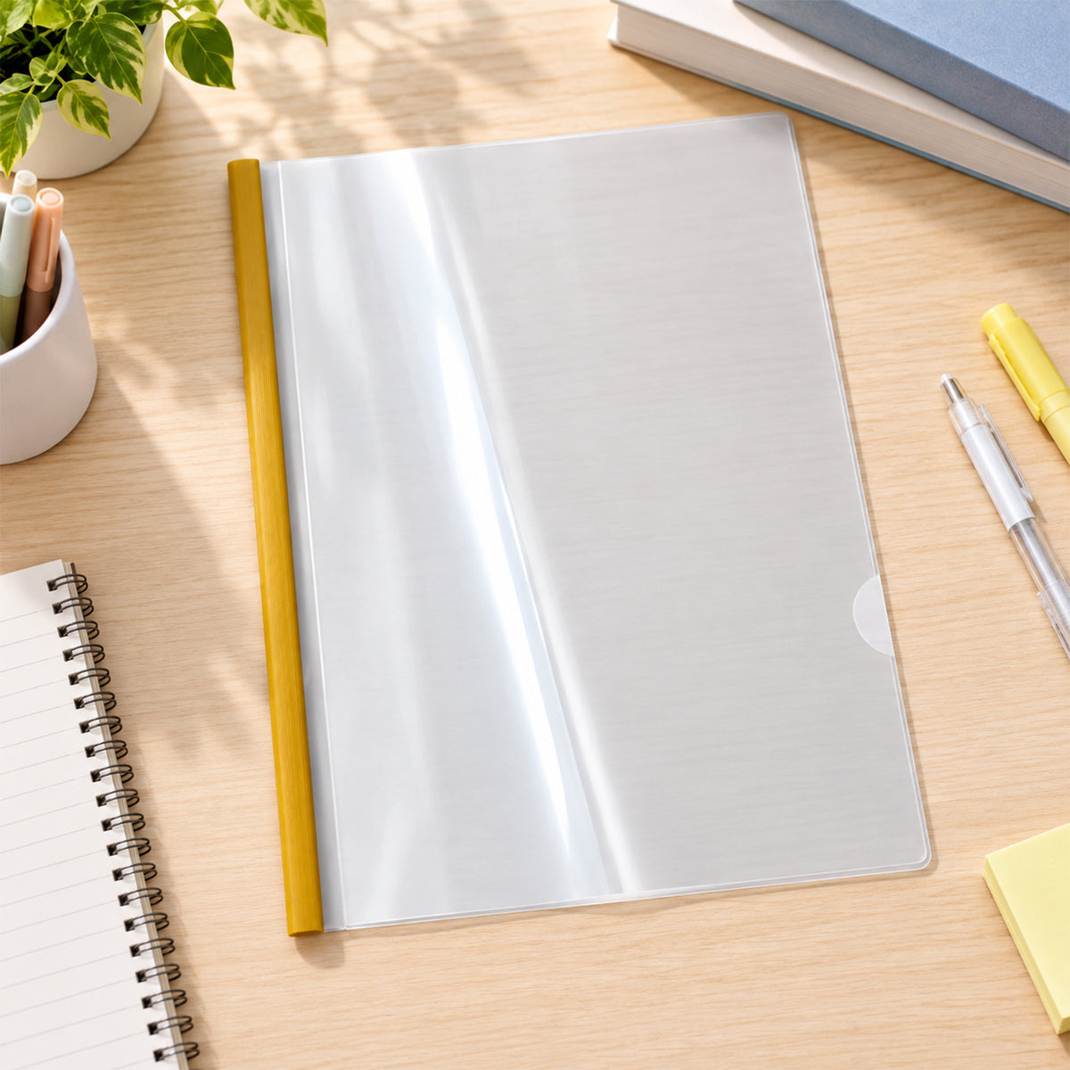 Transparent sliding document folder closed on a desk
