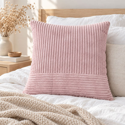 Pink ribbed pillow cover on bed