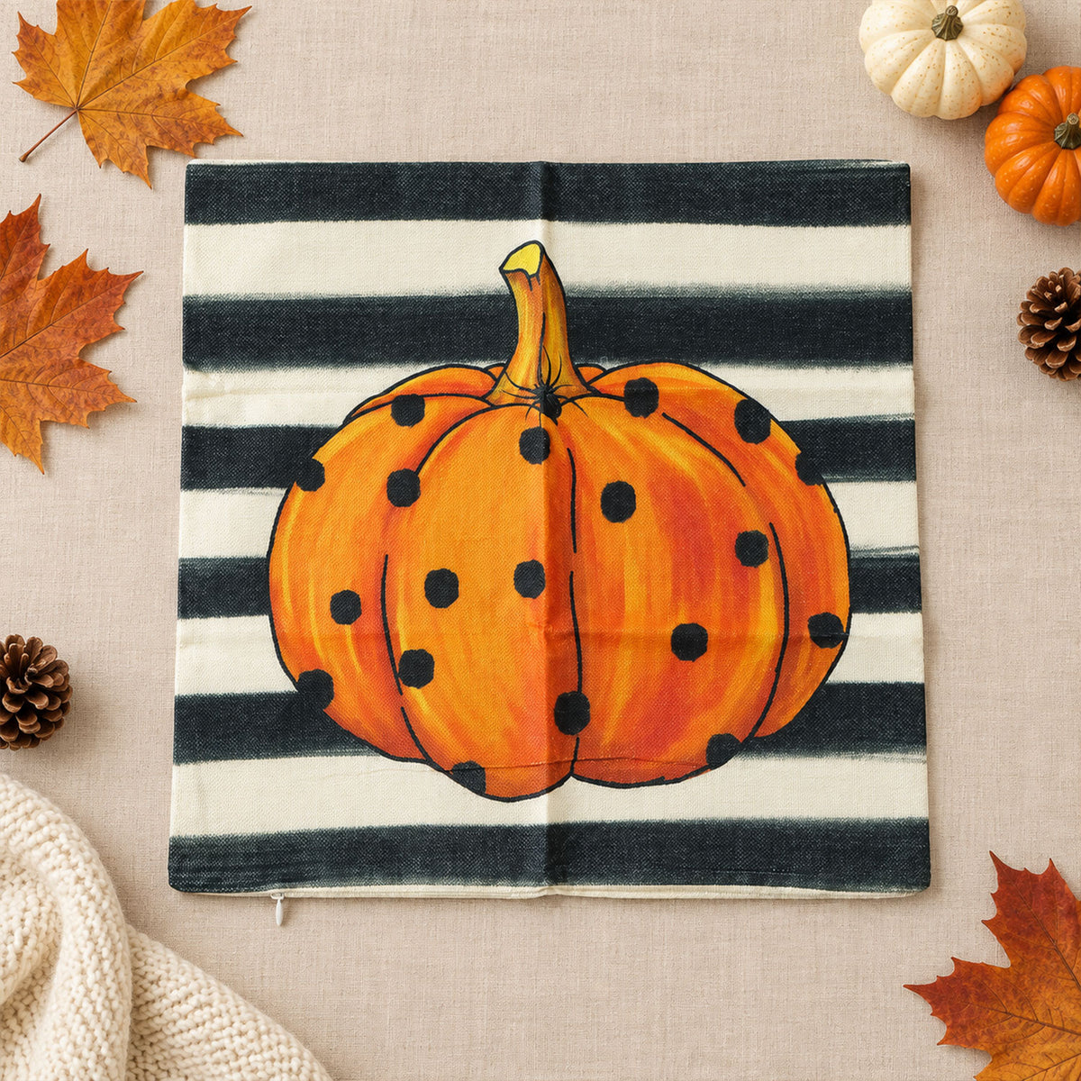 Pumpkin print pillow cover laid flat