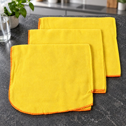 Three yellow cotton cleaning cloths