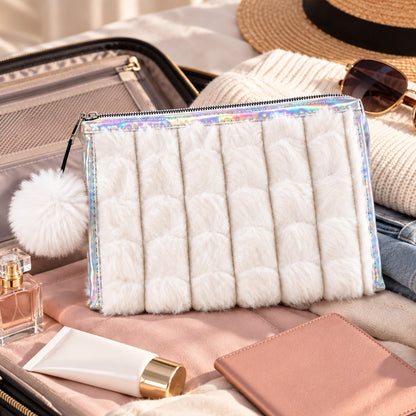 Cosmetic pouch beside travel luggage