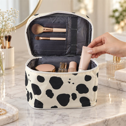 Spotted travel makeup pouch opened for cosmetics