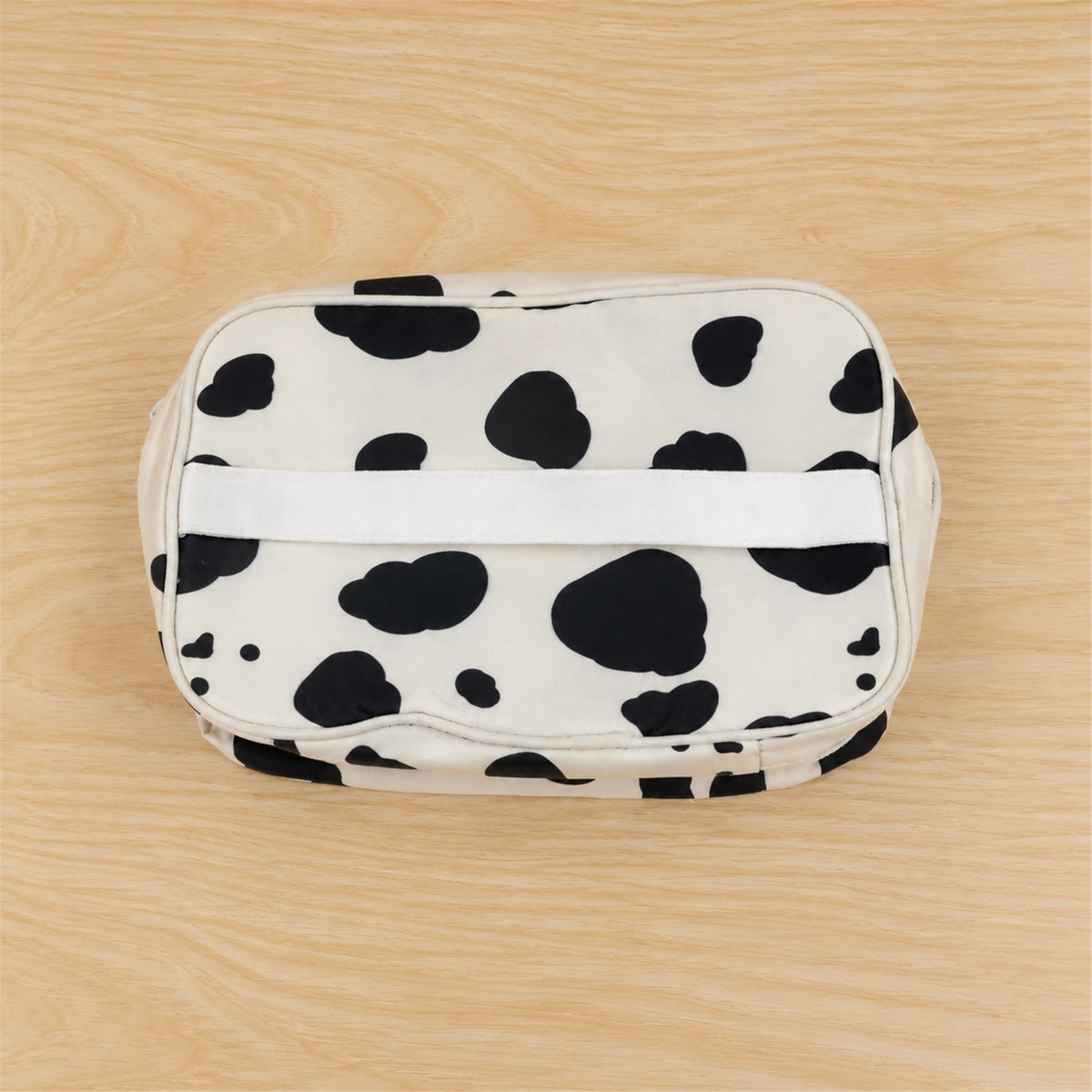 Actual photograph of spotted zipper pouch