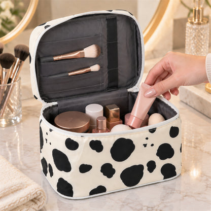 Open cosmetic pouch showing interior storage