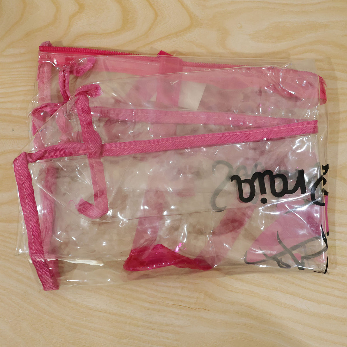 Actual photograph of folded transparent PVC tote bag