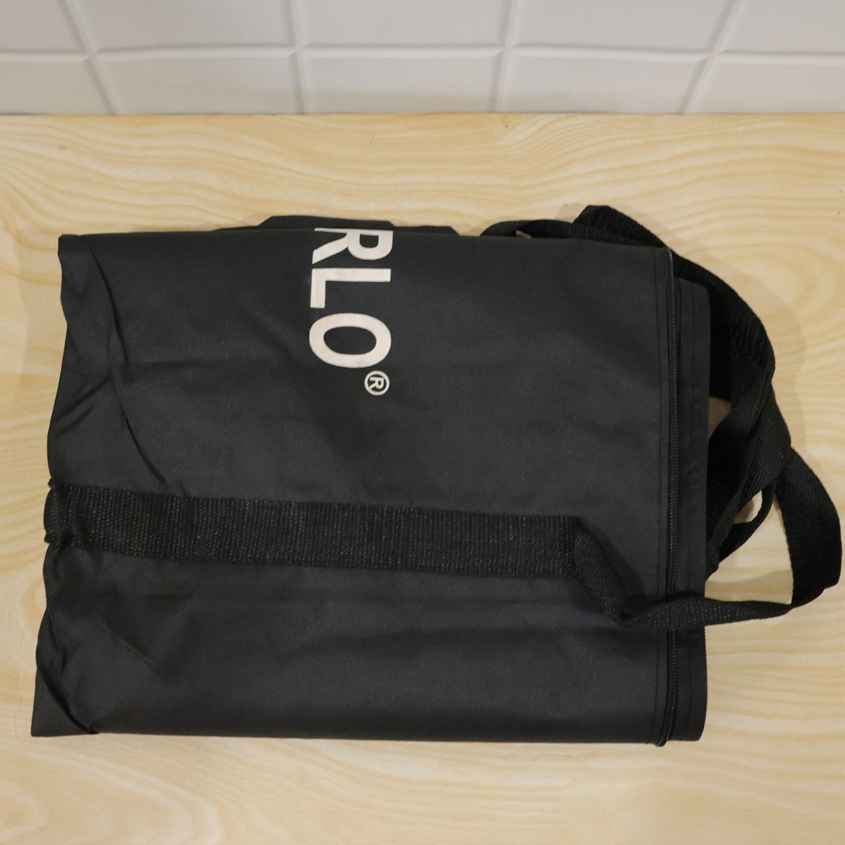 Actual photograph of folded sports kit bag