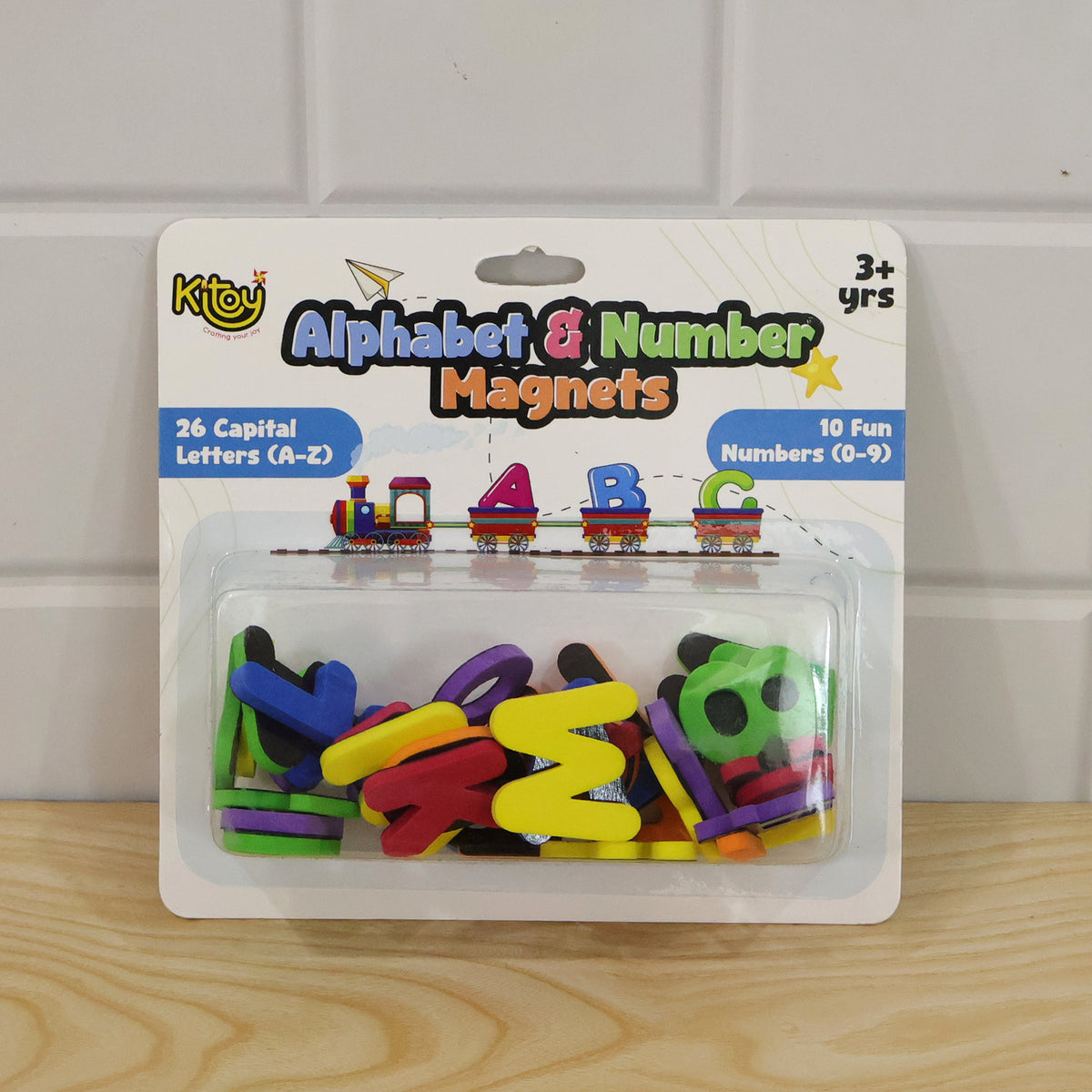 Actual photograph of alphabet and number magnet set in card packaging