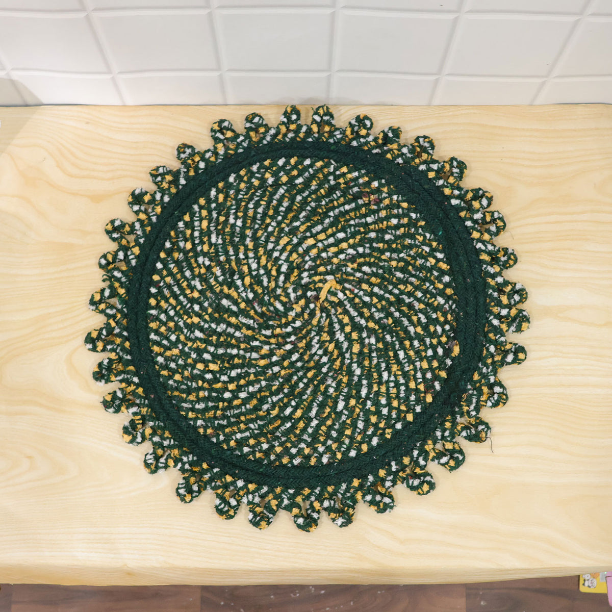 Actual photograph of round braided floor mat