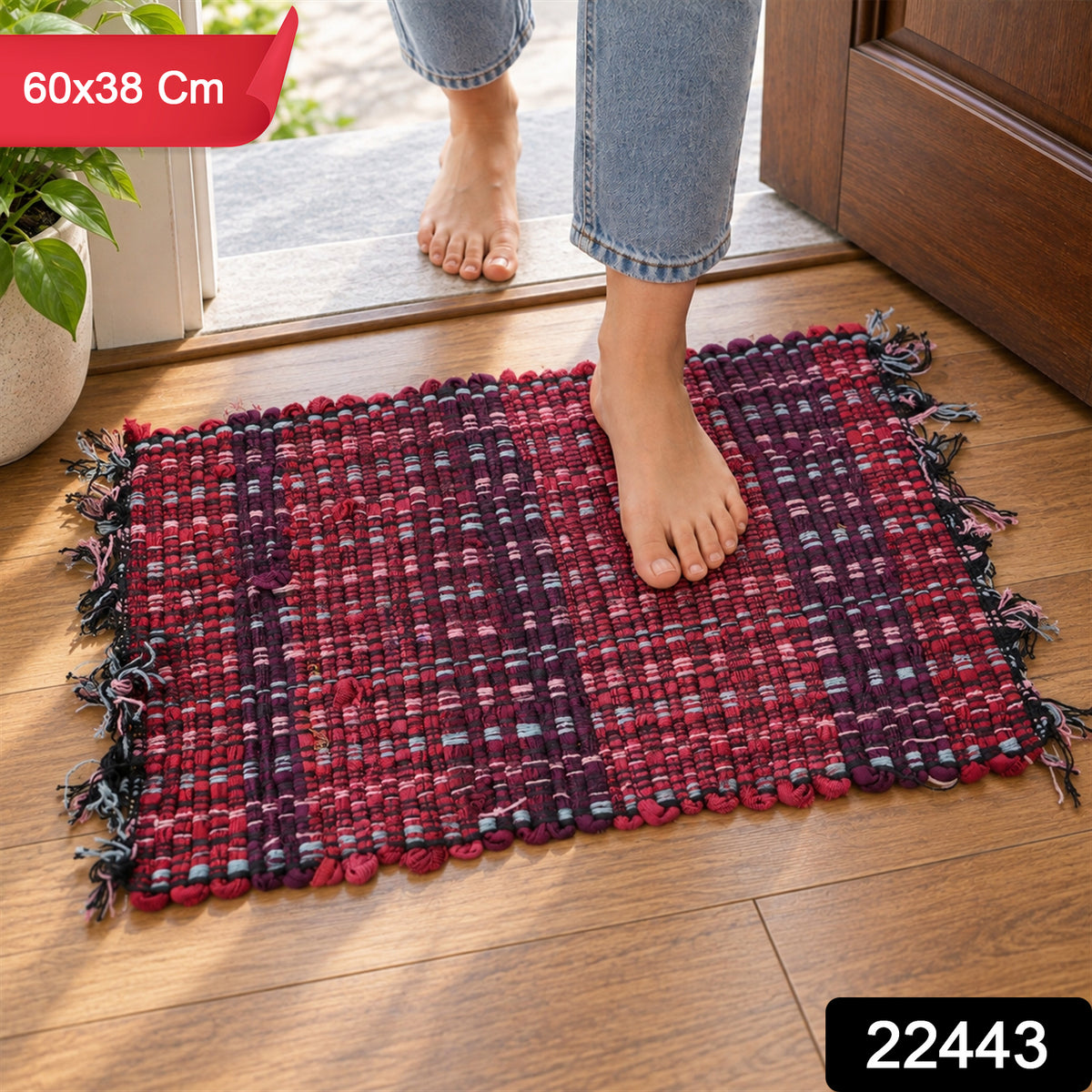 Decorative woven floor mat with product code 22443 and 60x38 cm label
