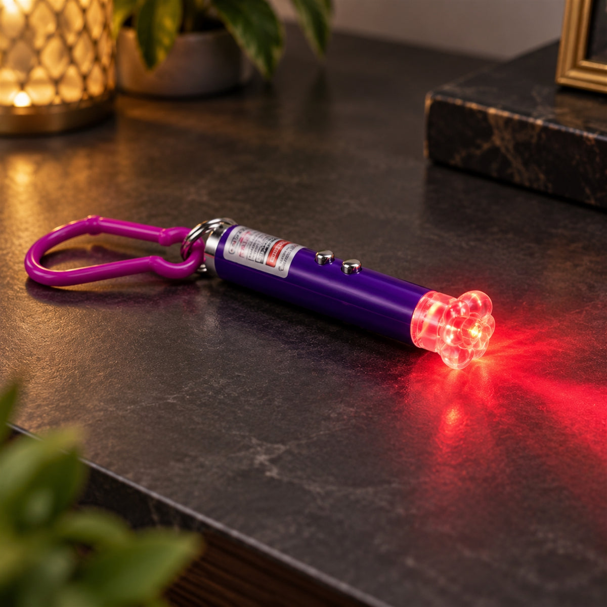 Laser pointer keychain light with flower-shaped cap