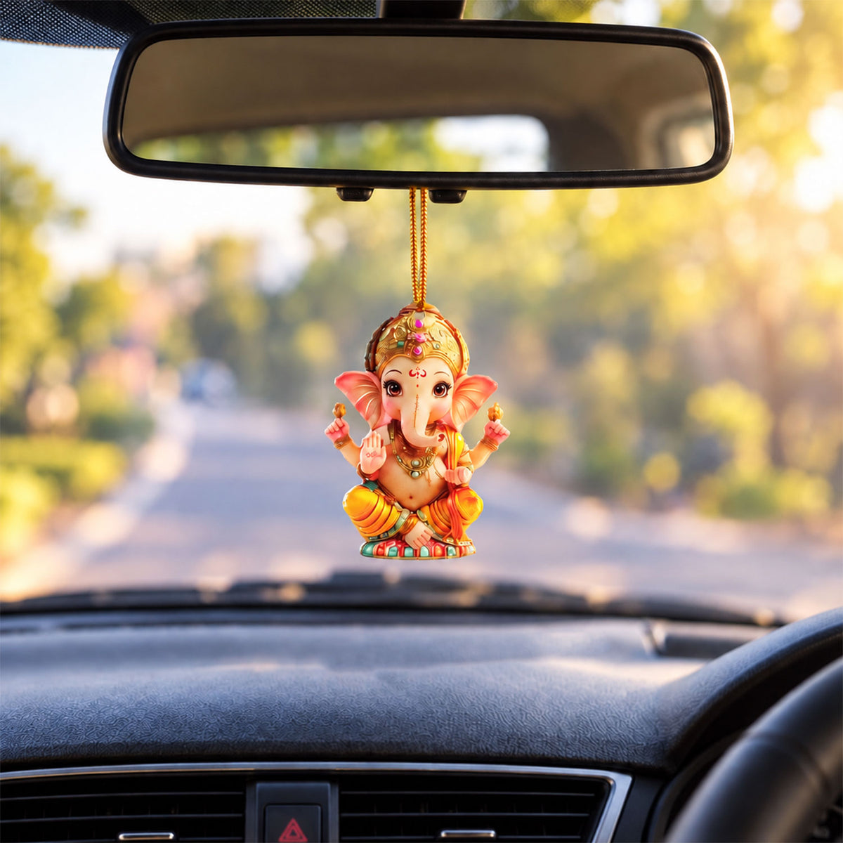 Ganpati hanging decoration displayed in a car