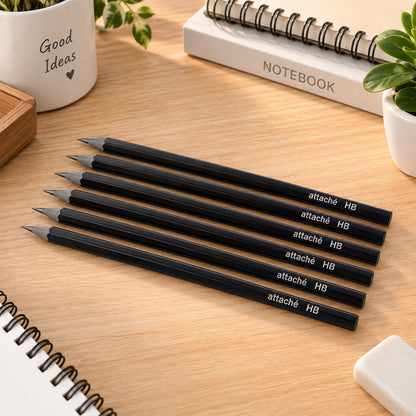 Six HB graphite pencils on desk