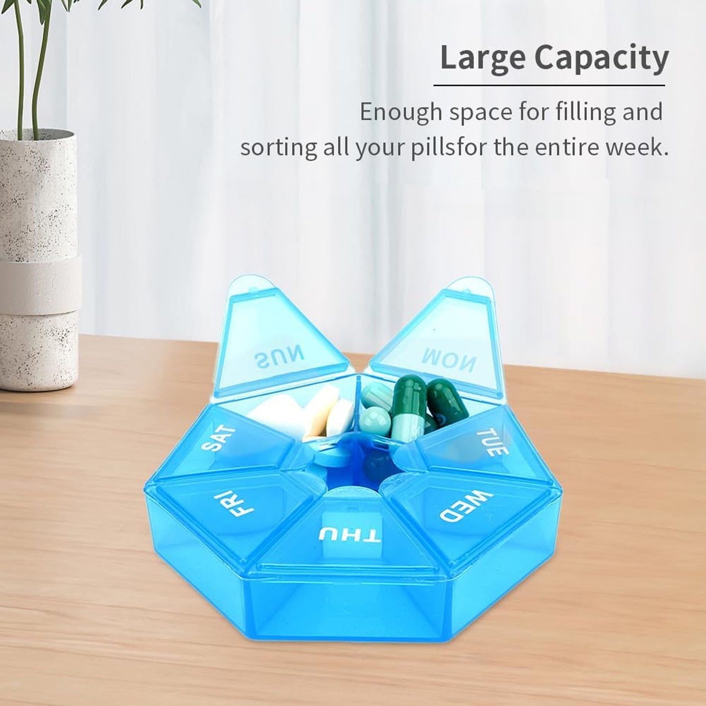 Seven day pill organizer with large compartments