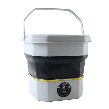 Mini folding washing machine on white background