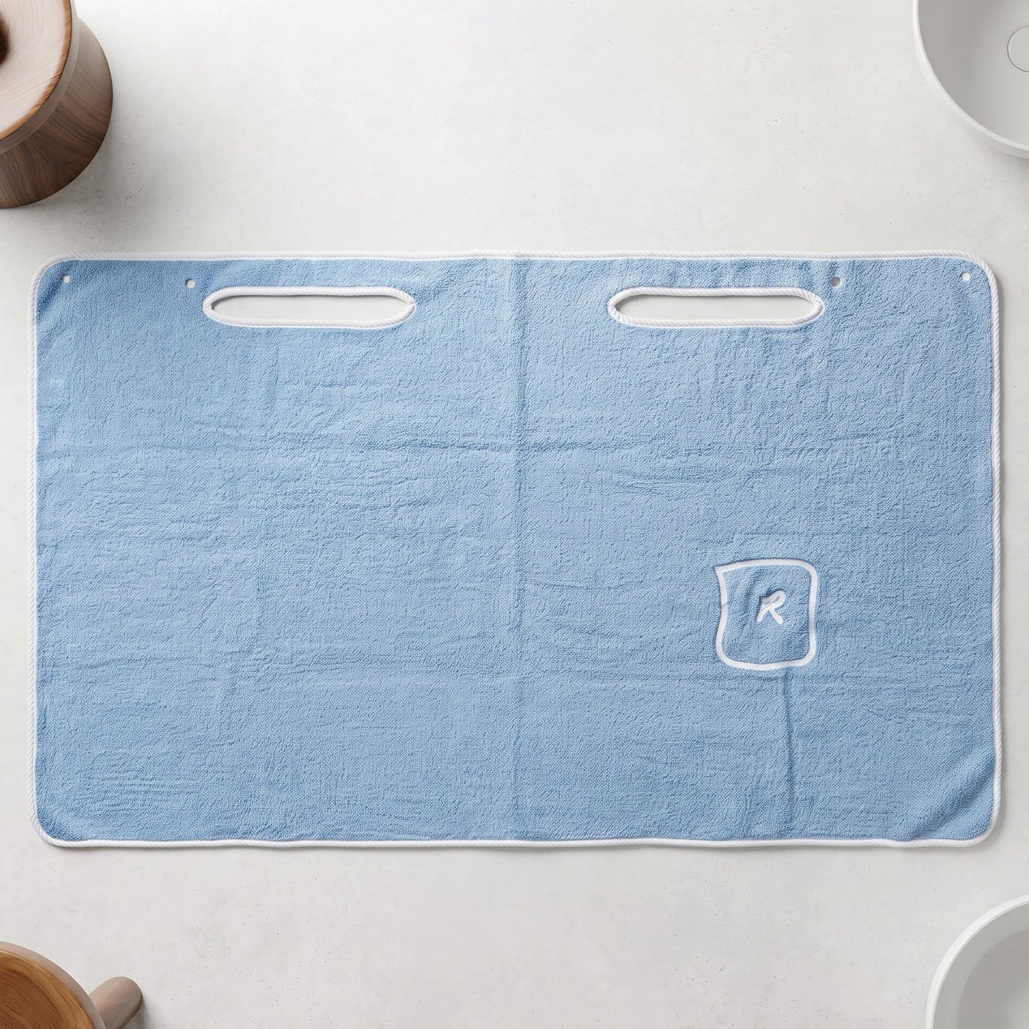 Absorbent towel with hand openings