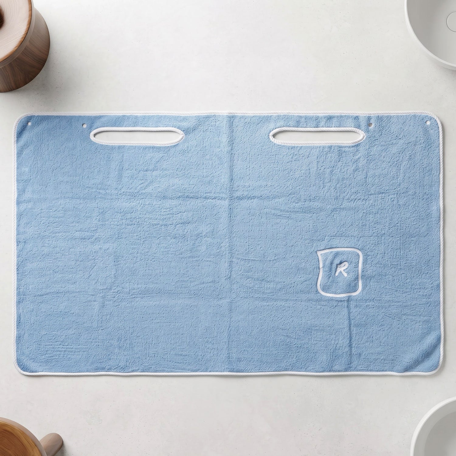 Absorbent towel with hand openings