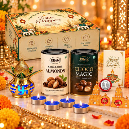 A collection of Diwali items including a decorative box, two chocolate tins, a golden kalash, four lit tealights, and a