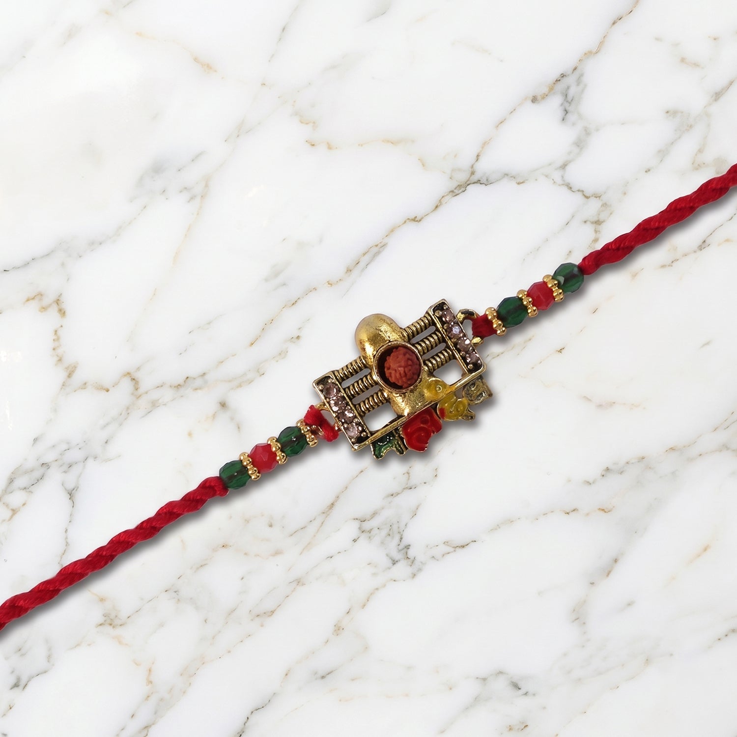 Traditional Shivling Rudraksha Rakhi with Red & Green Beads
