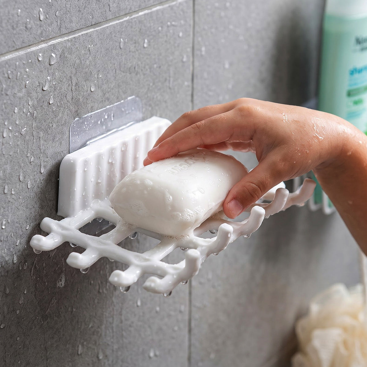 Self adhesive soap holder installation view