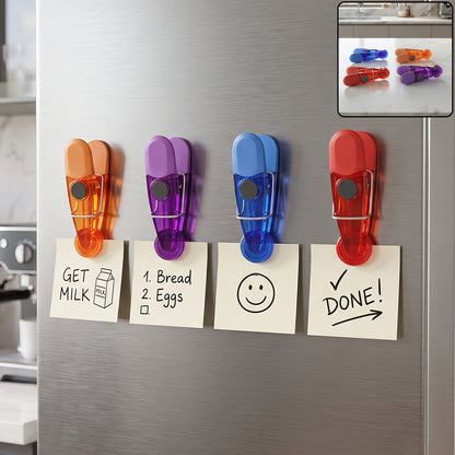 Colourful magnetic clips holding notes on refrigerator
