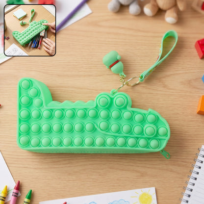 Colorful silicone pencil pouch in use as a fun stationery accessory.