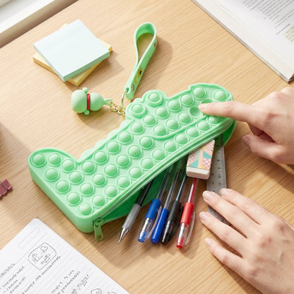 Kids happily using the pastel silicone fidget pencil pouch for school activities.