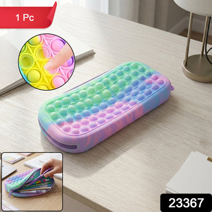 Kids holding a silicone pop it pencil pouch with push pop bubbles during school