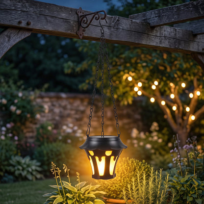 Warm LED solar lantern hanging in garden