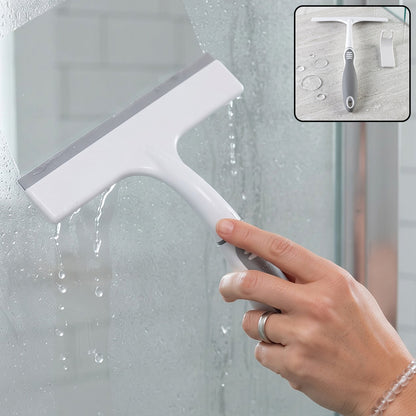 Plastic multifunctional glass wiper in use