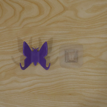 Actual plastic butterfly hook and adhesive mount