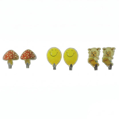 Cartoon adhesive hooks on white background