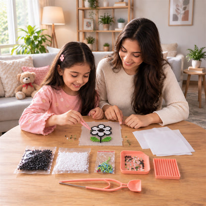 Parent and child making fuse bead pixel art together