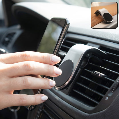 Magnetic car air vent phone holder in use