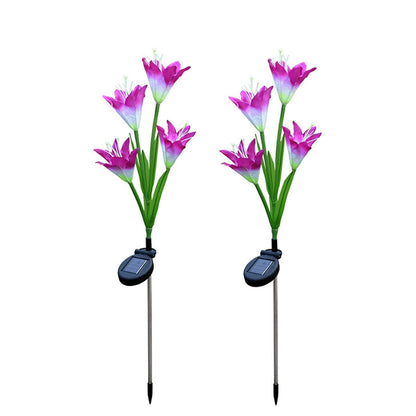 Solar flower stake lights on white background