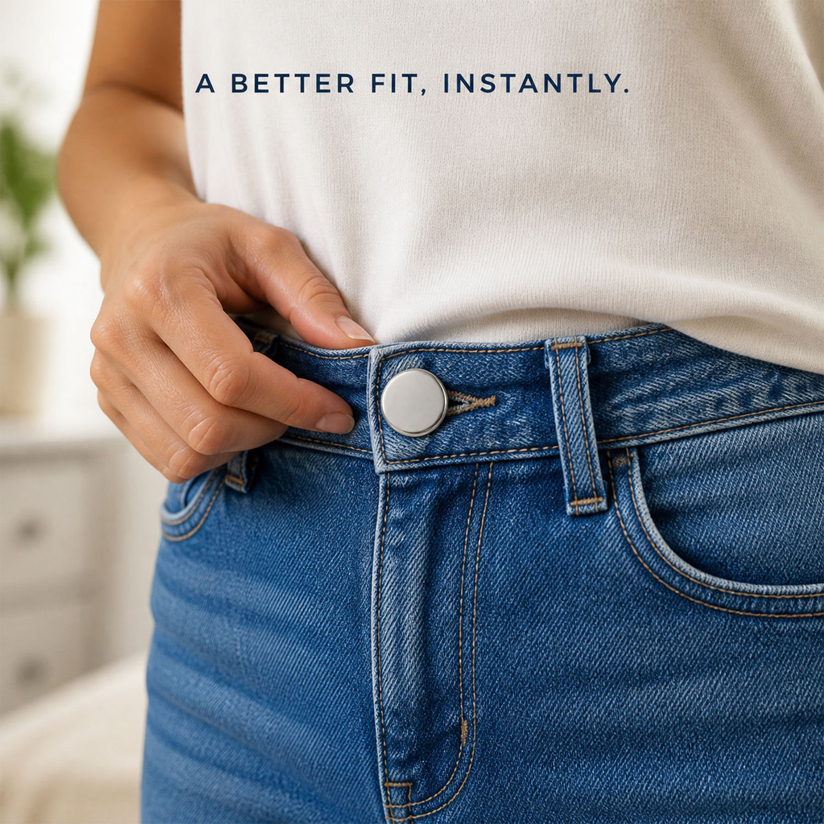 Metal button stud installed on jeans waistband