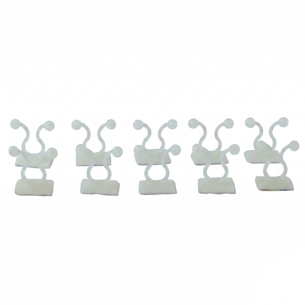Plant climbing holder clips on white background